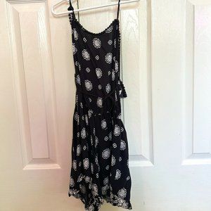 Black romper with white design